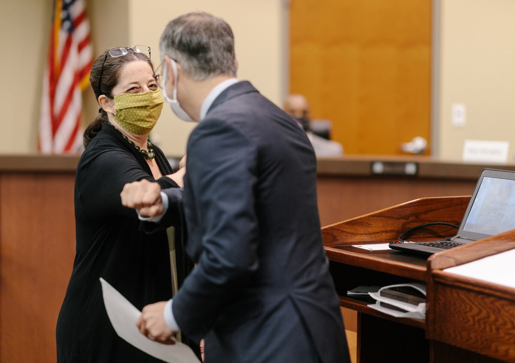 Jeanne Snodgrass bumps elbows with Peter Stiepleman